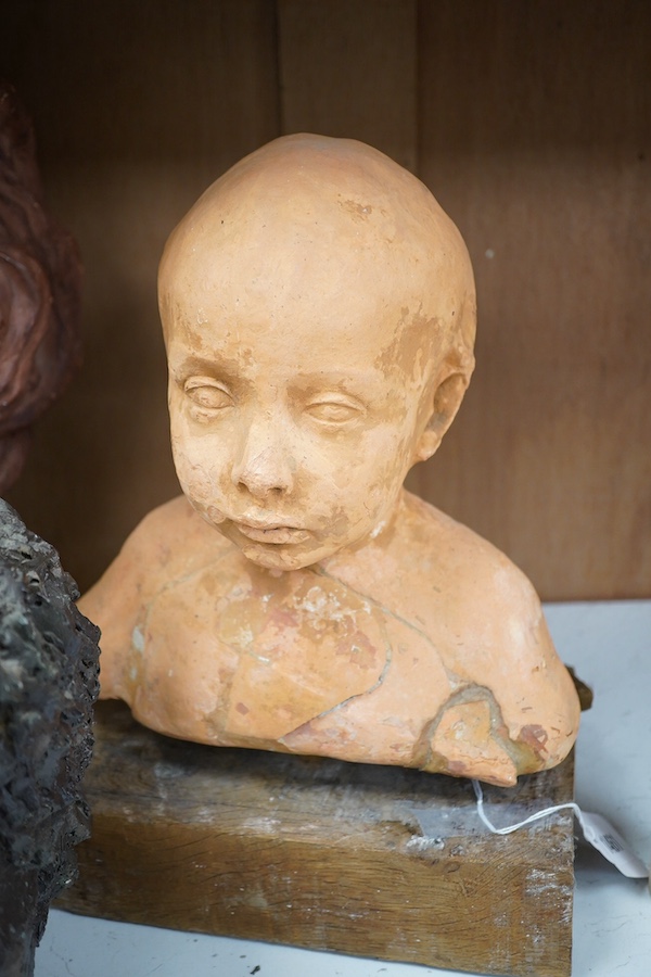 Three busts including a terracotta example of a child, tallest 42cm. Condition - poor